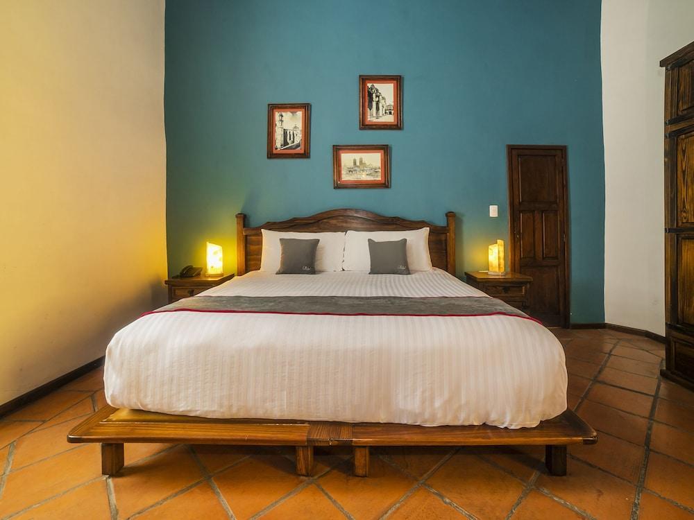 Collection O Al Otro Lado Del Rio, Puebla酒店 外观 照片 A bedroom at the hotel