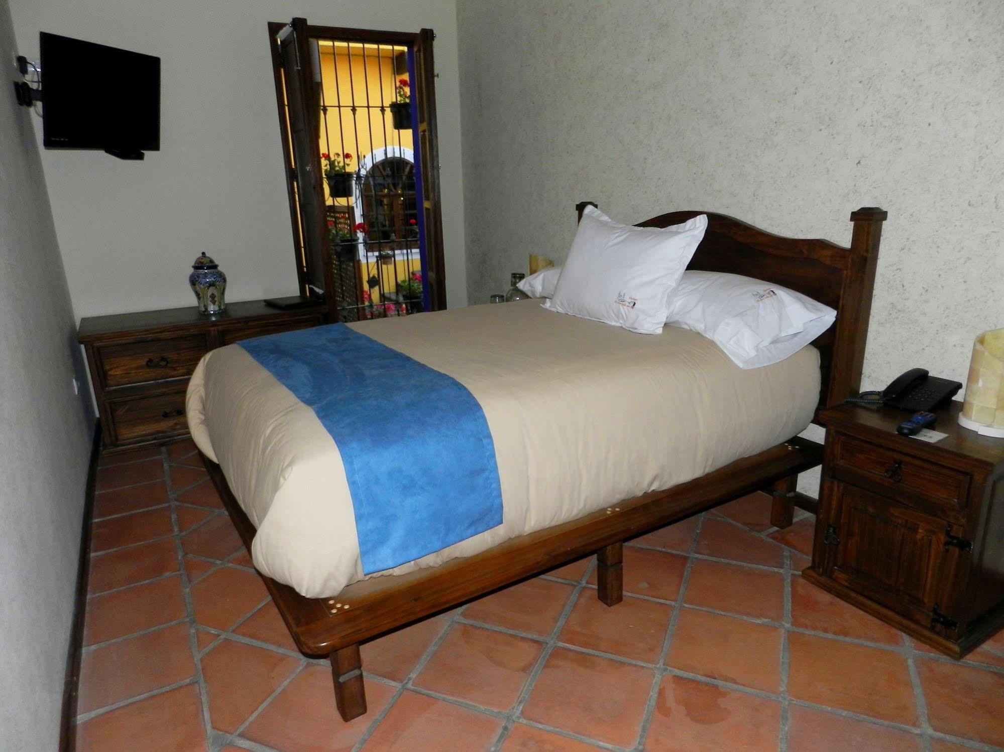 Collection O Al Otro Lado Del Rio, Puebla酒店 外观 照片 A room at Hotel San Cristóbal