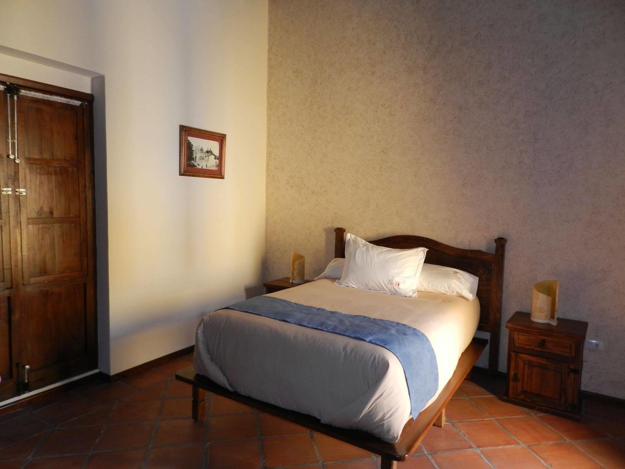 Collection O Al Otro Lado Del Rio, Puebla酒店 外观 照片 A room at the hotel
