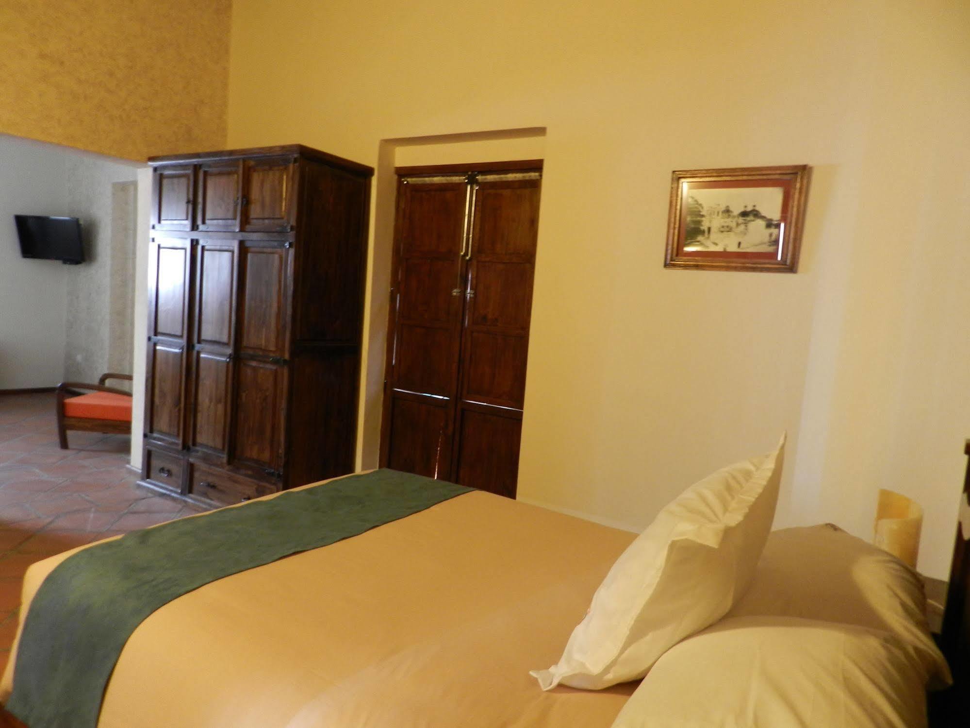 Collection O Al Otro Lado Del Rio, Puebla酒店 外观 照片 A room at the hotel